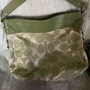 Coach with leather trim and extra long leather strap hobo signature